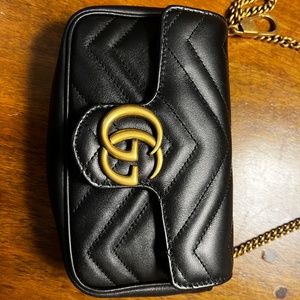 Beautiful authentic Gucci Marmont Leather Super Mini shoulder bag, Black